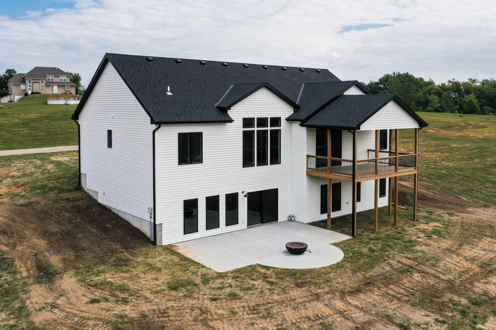 Exterior of the Millstone Terrace custom home at dusk