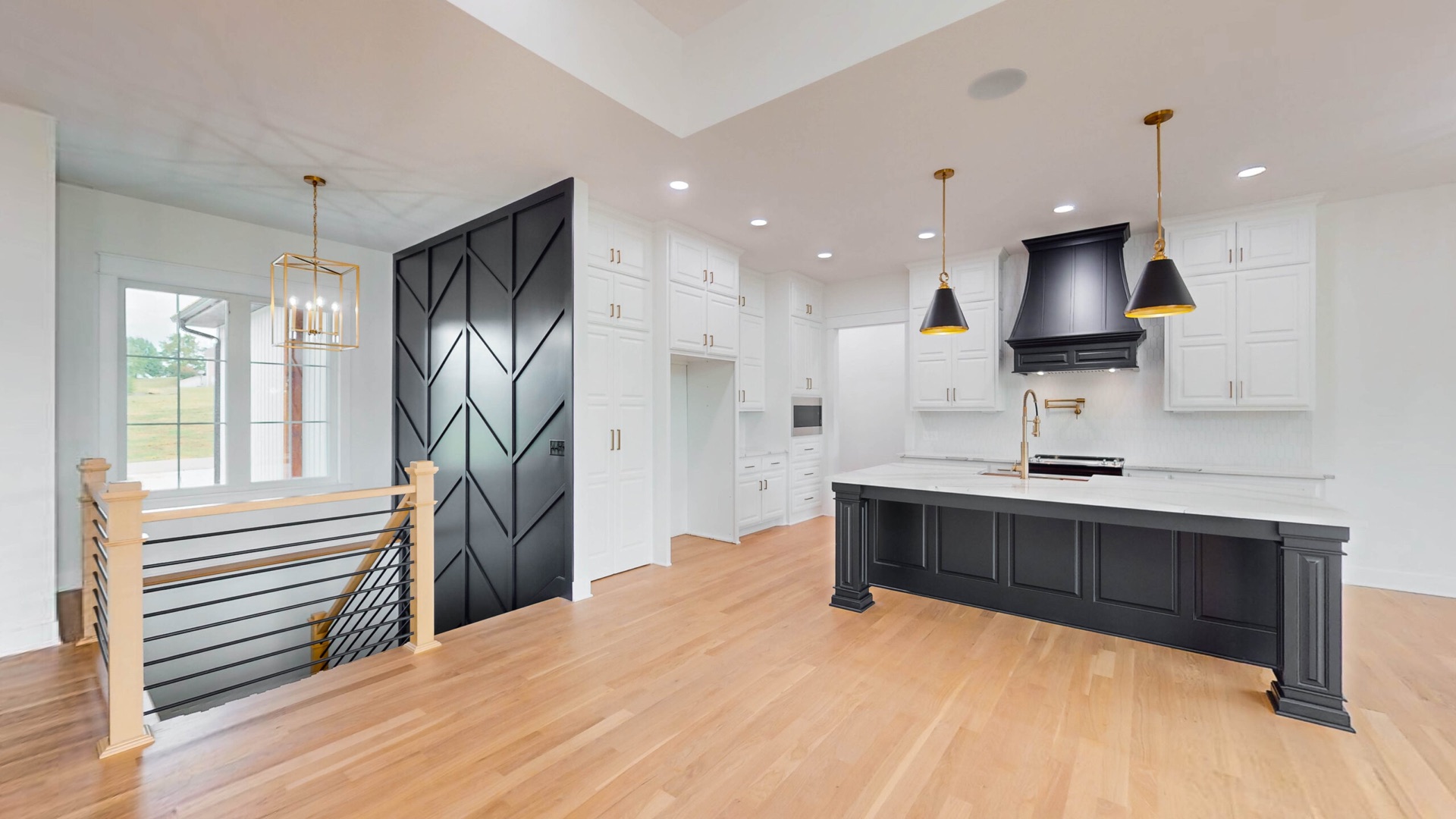 E-Star custom kitchen with black and white cabinetry